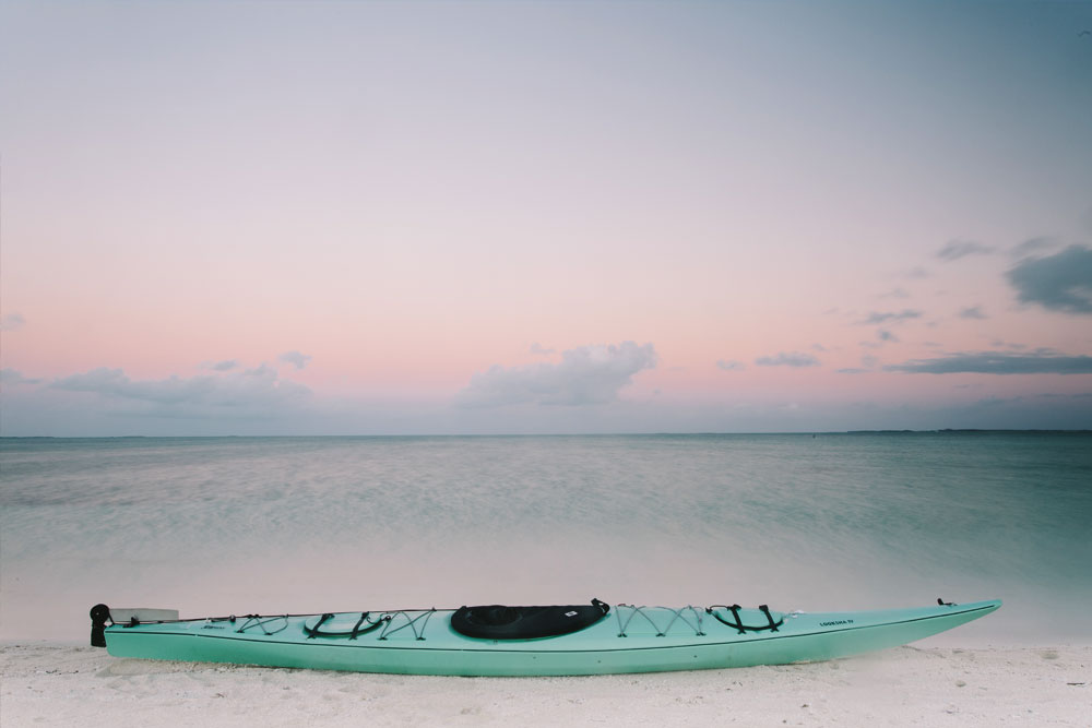 Kayak on sandy beach Bahamas