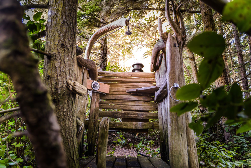 Rustic outdoor showers seamlessly blended with nature