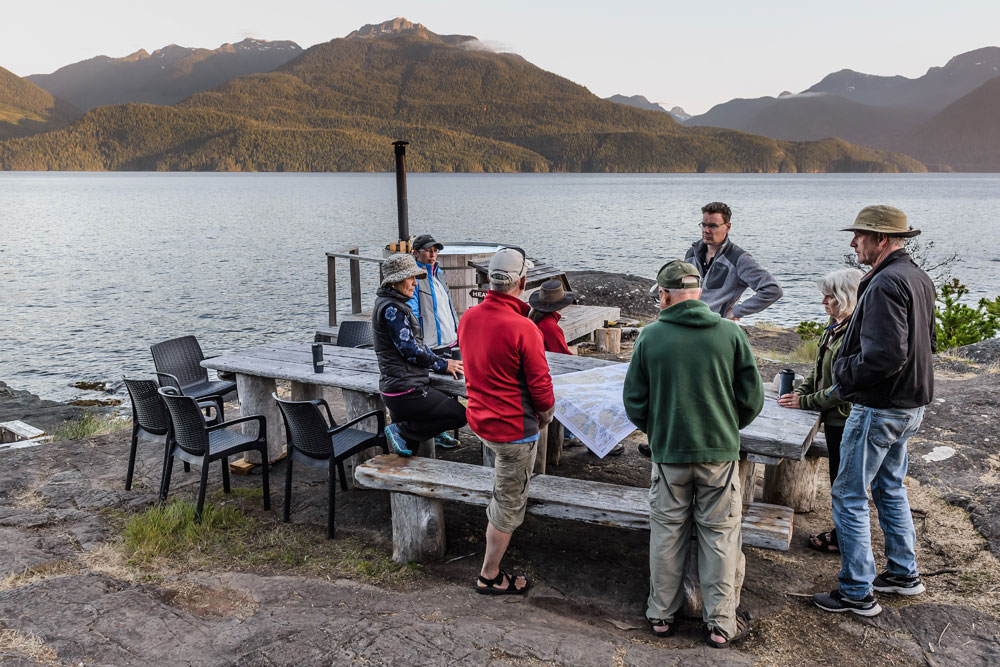 Guides planning daily paddle with guest