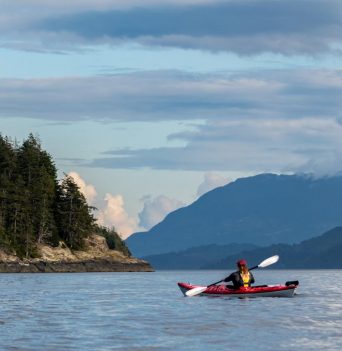 Kayaker heading to camp in Johnstone Strait