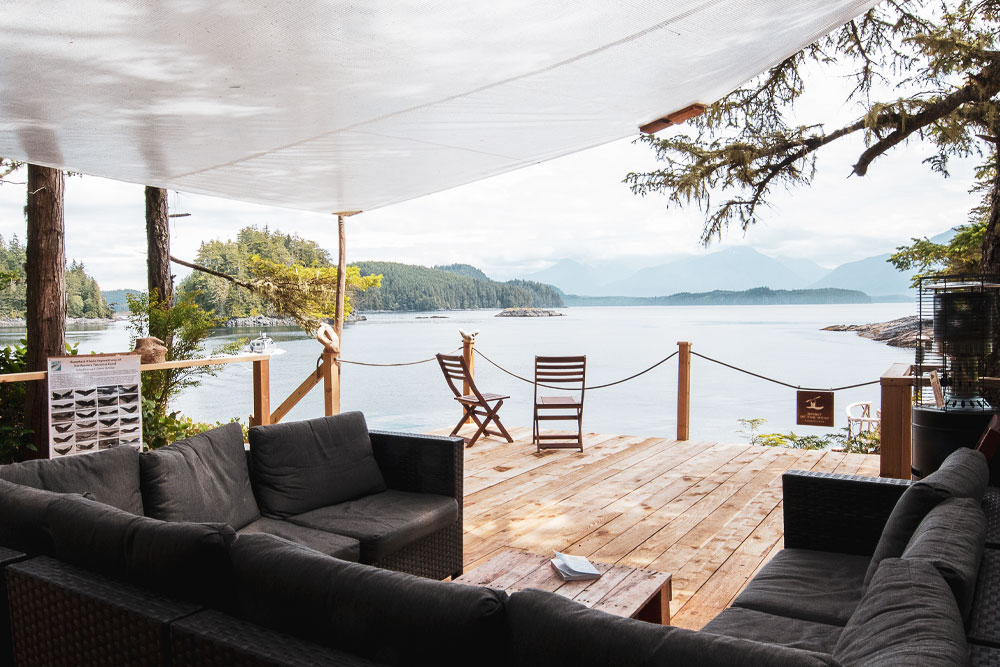 Glamp styled sheltered outdoor patio area with views of Blackfish Sound.