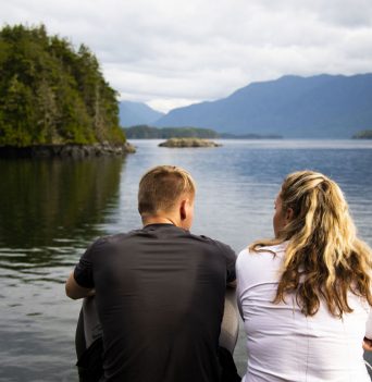 Two guests enjoying the views from glamping site