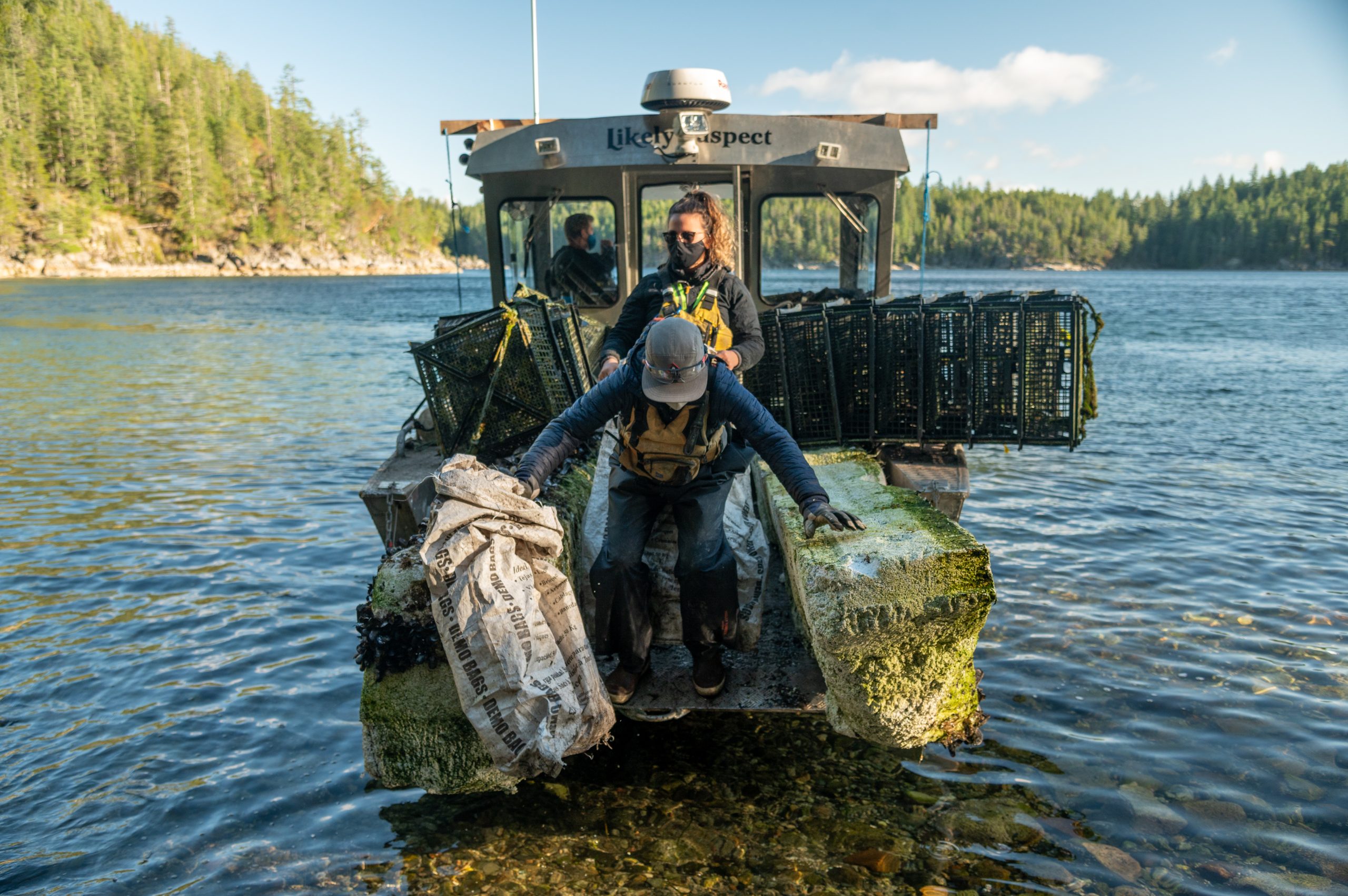 Picking up garbage in a boat