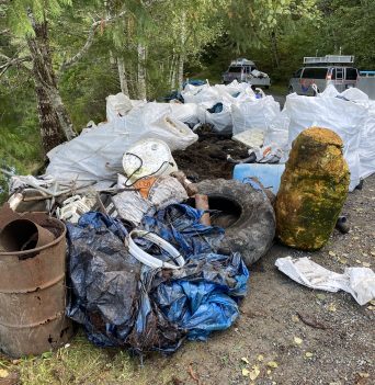 Piles of marine debris gathered on the north end of Quadra Island