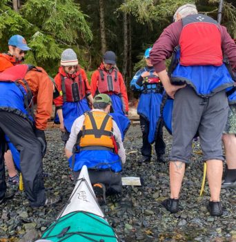 Tour group planning kayak for the day