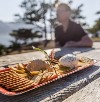 A charcuterie board served during the Johnstone Strait Ultimate tour