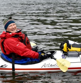 Happy kayaker resting on the Johnstone Strait