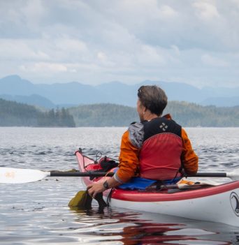 Kayaker in bed on kelp