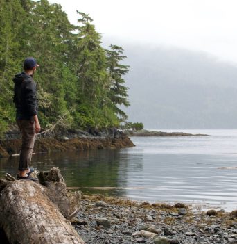 Kayaker taking in the scenic views of the BC coast