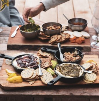 Wine and cheese spread served as part of glamping tour
