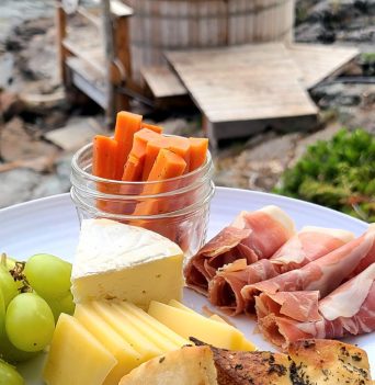 Cheese and snack board provided during Glamping tour