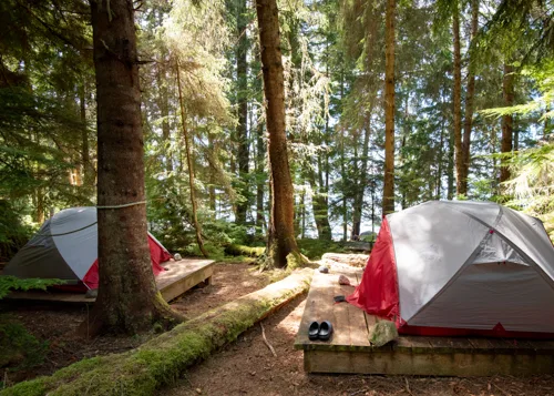 Two tents on platforms in Coastal BC