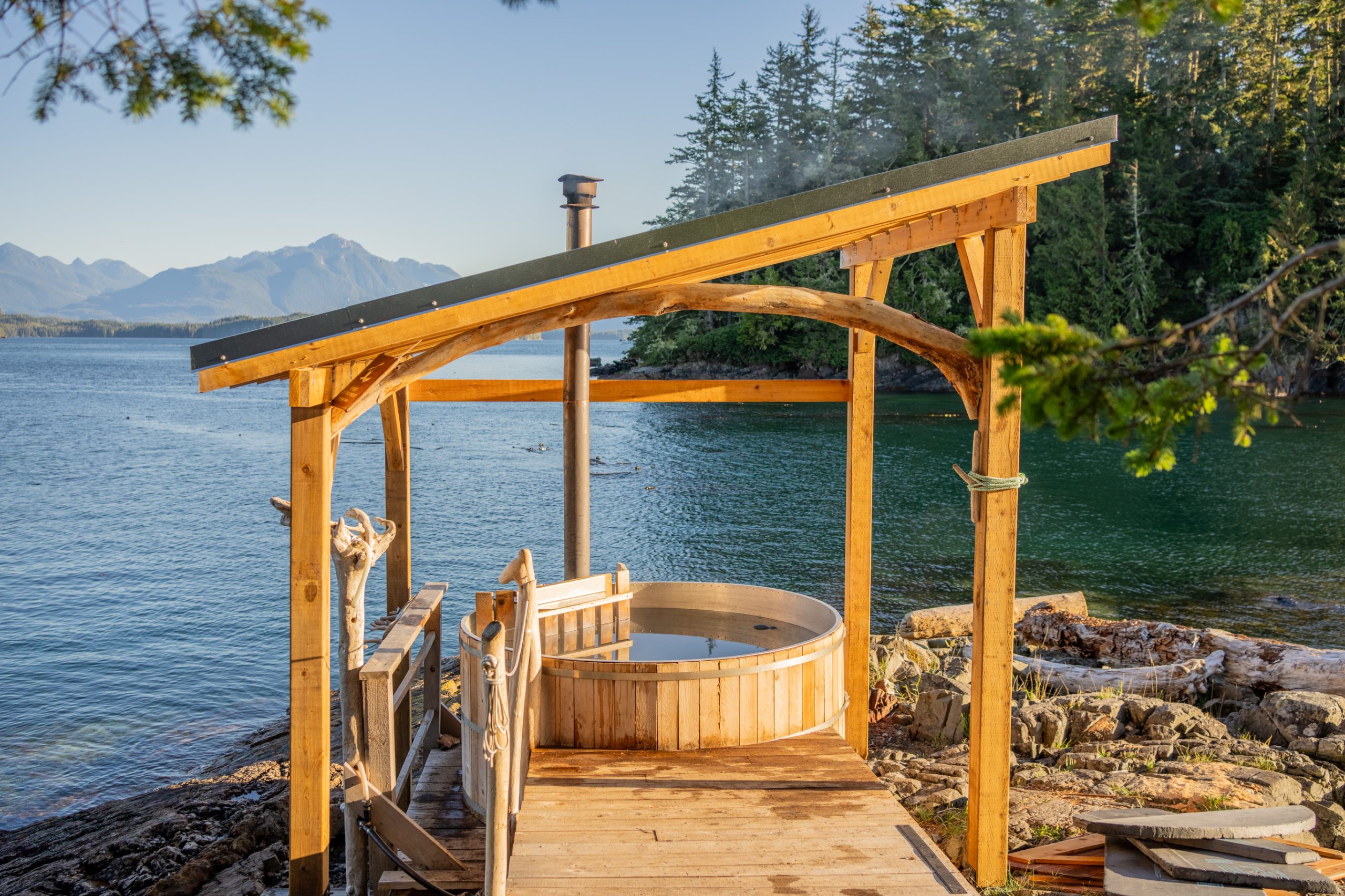 Outdoor hot tub with a roof
