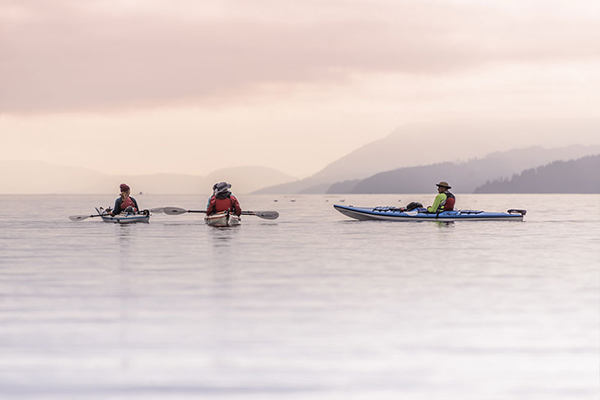 Kayakers at sunset