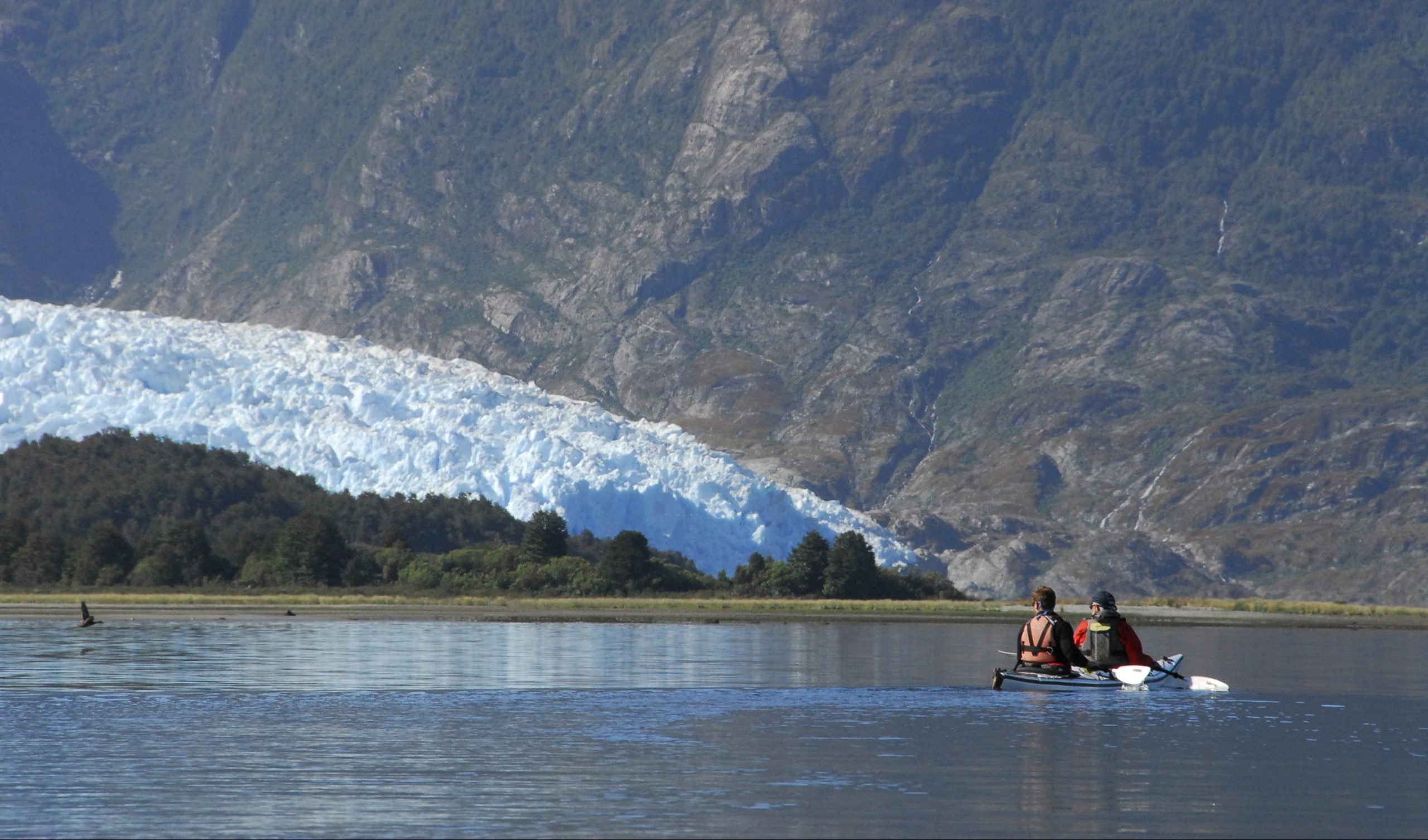 Kayakers birwatching in Chile Patagonia