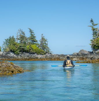 A kayaker resting off the coast of the Great Bear Rainforest