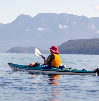 A kayaker paddling in Desolation Sound
