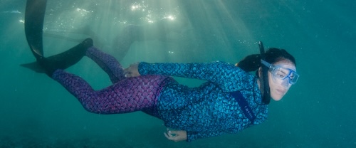 A snorkeler in the turquoise waters of Baja Mexico