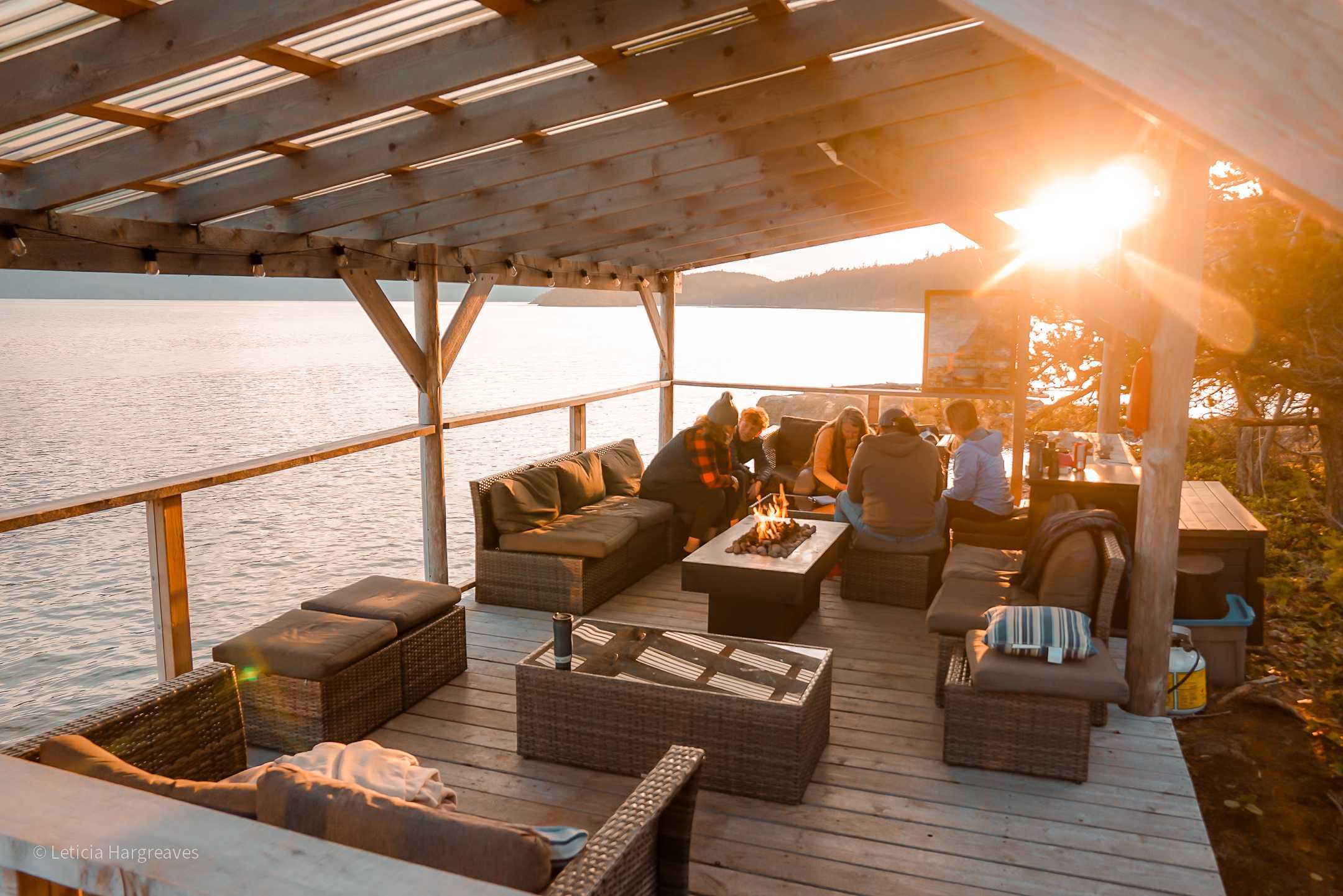 Johnstone Strait group enjoying the lounge in the sunset