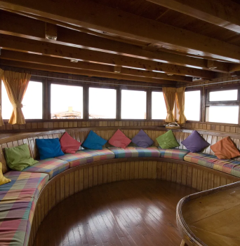 The interior lounge area of the Alba